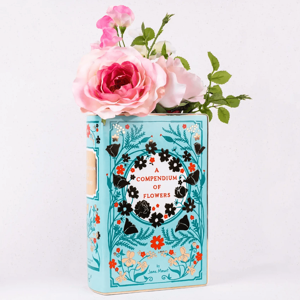 High-quality ceramic. Includes the Oscar Wilde quote, "With freedom, books, flowers, and the moon, who could not be happy?"