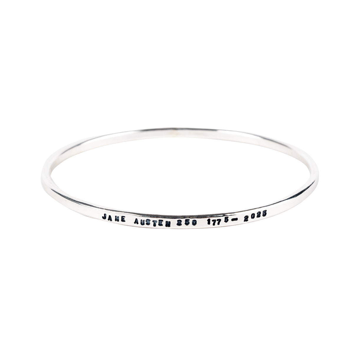 Silver bangle bracelet engraved with 'Jane Austen 250 1775-2025'