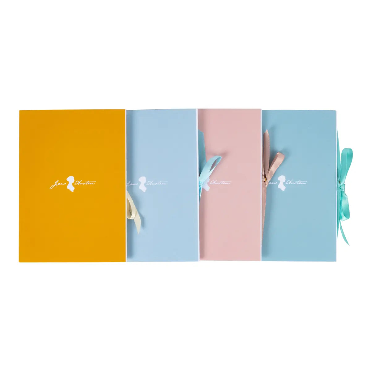 The backs of four Jane Austen themed greetings cards against a white background