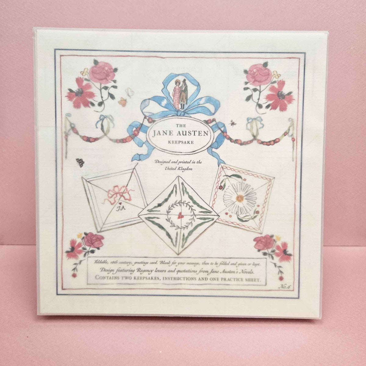 Jane Austen themed letter set packaging on a pink background