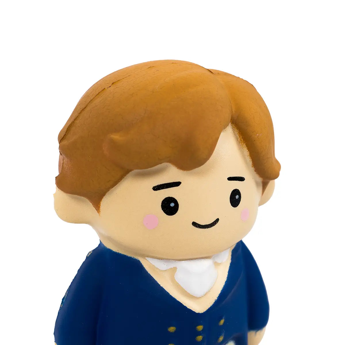 a close up of the Mr. Darcy Squishi Pal's face against a white background