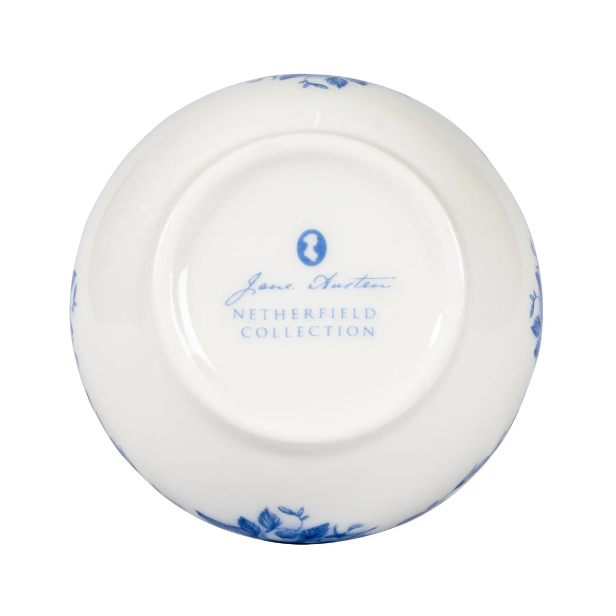 White, bone china sugar bowl with blue, floral patterns.