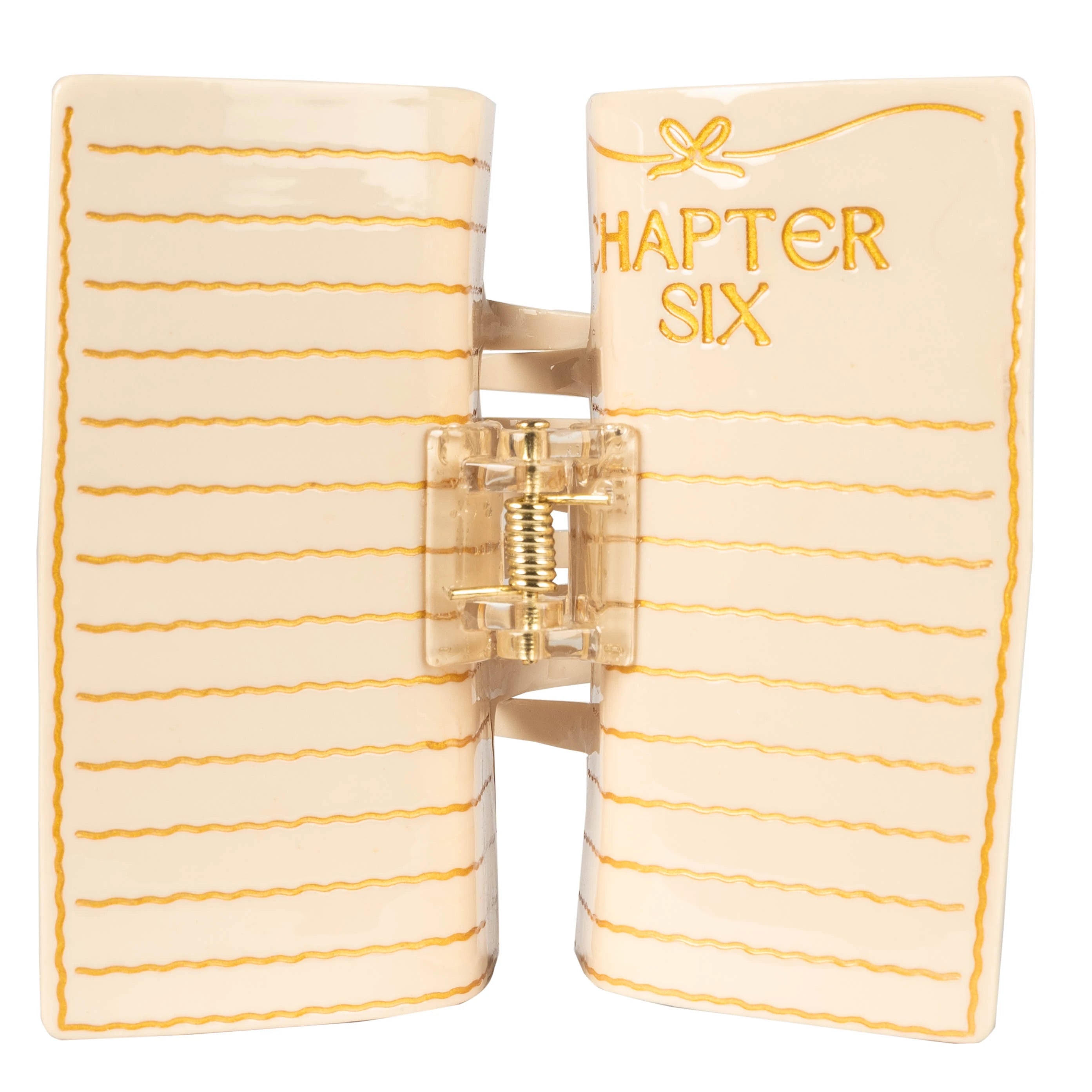 Top view of a hair Claw Clip designed as an open book with text of ' Chapter Six' printed on it