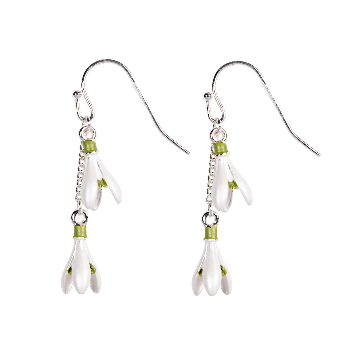 A pair of handcrafted snowdrop earrings with enamel white flowers and green accents on a silver-colored hook.