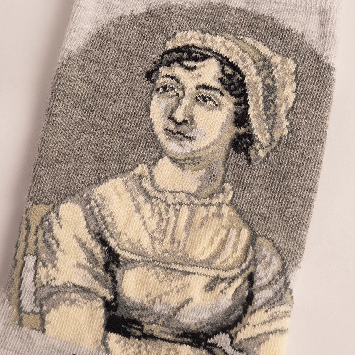 Greyscale portrait of Jane Austen on a sock