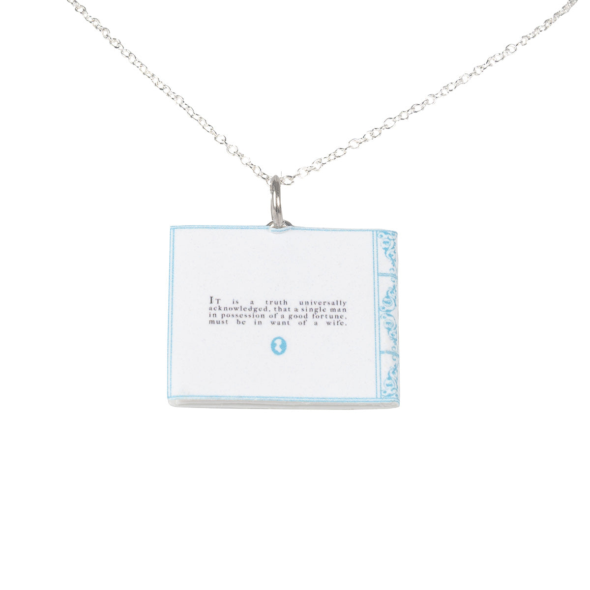 Closeup of back of necklace with quote from Pride and Prejudice