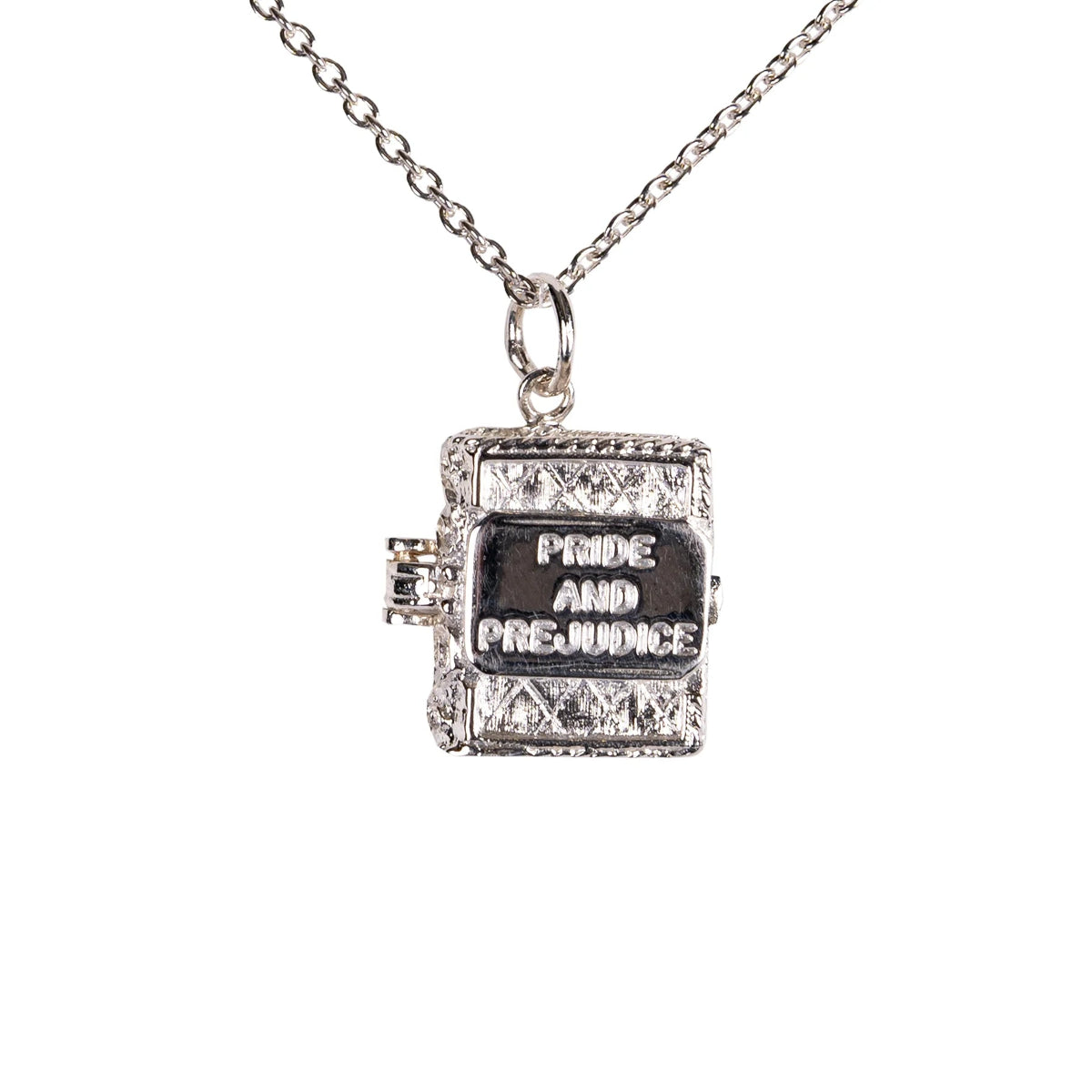 A silver book charm necklace featuring a miniature pendant with the cover title 'Pride and Prejudice' by Jane Austen.