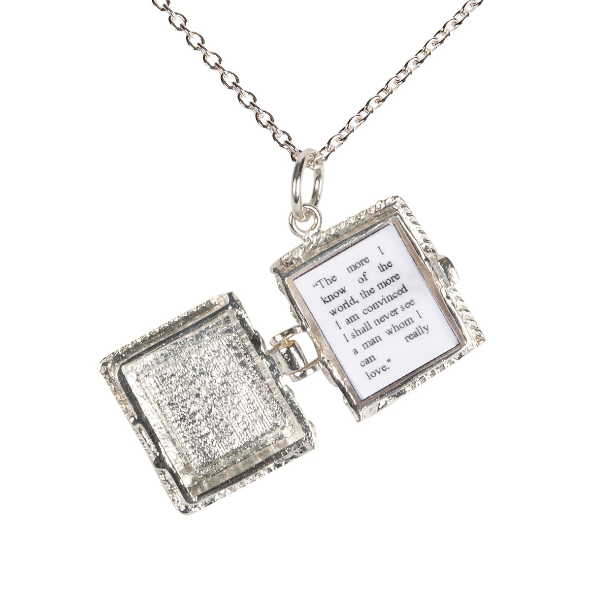 Open Sense and Sensibility charm showing a page from the novel on a white background.