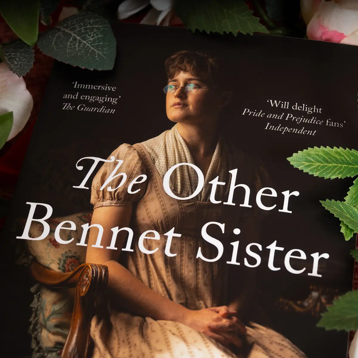 Close up on details on The Other Bennet Sister cover with positive reviews from The Guardian and Independent