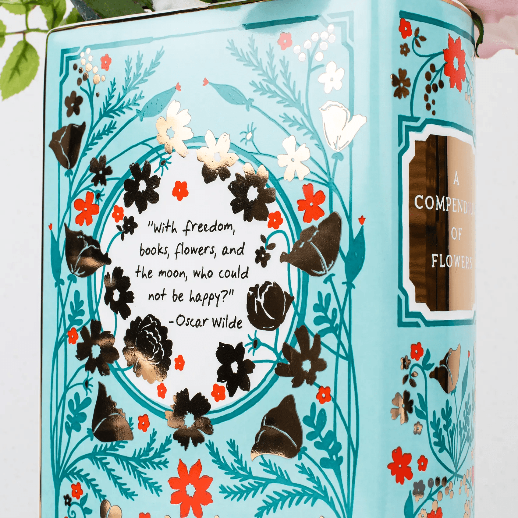 High-quality ceramic. Includes the Oscar Wilde quote, "With freedom, books, flowers, and the moon, who could not be happy?"