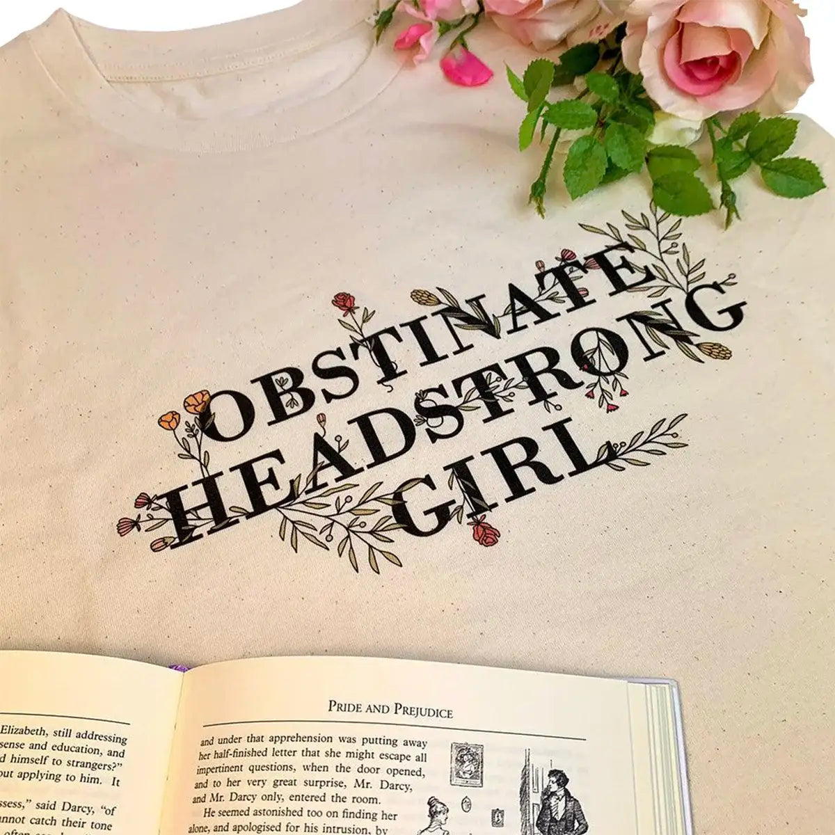 t shirt tableaux with book and flowers