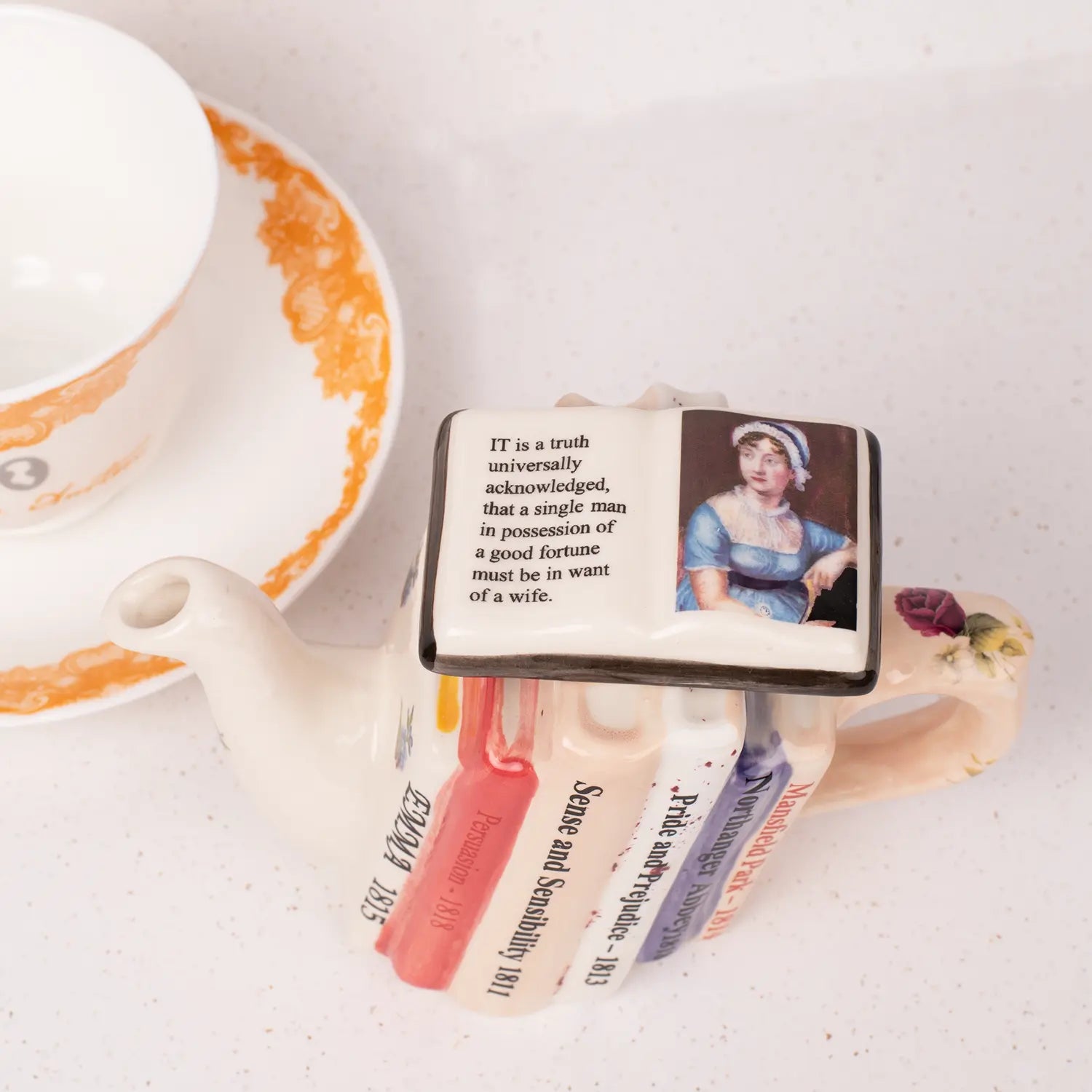 Intricately designed to resemble a row of classic Jane Austen novels.