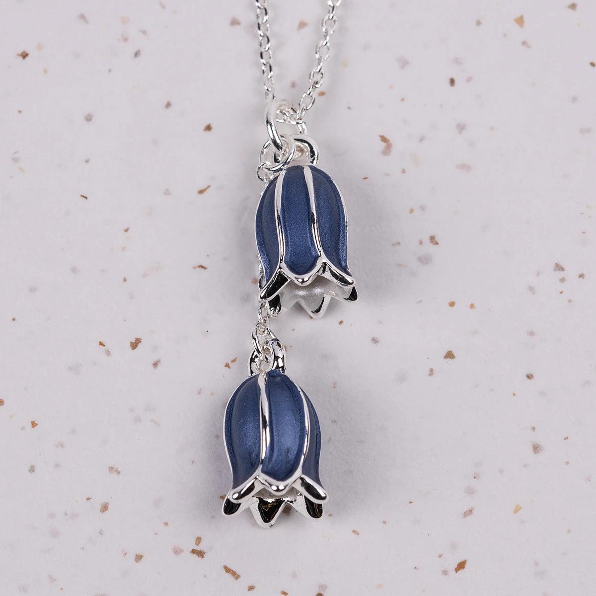 Costume jewellery necklace of 2 bluebells on a a silver necklace