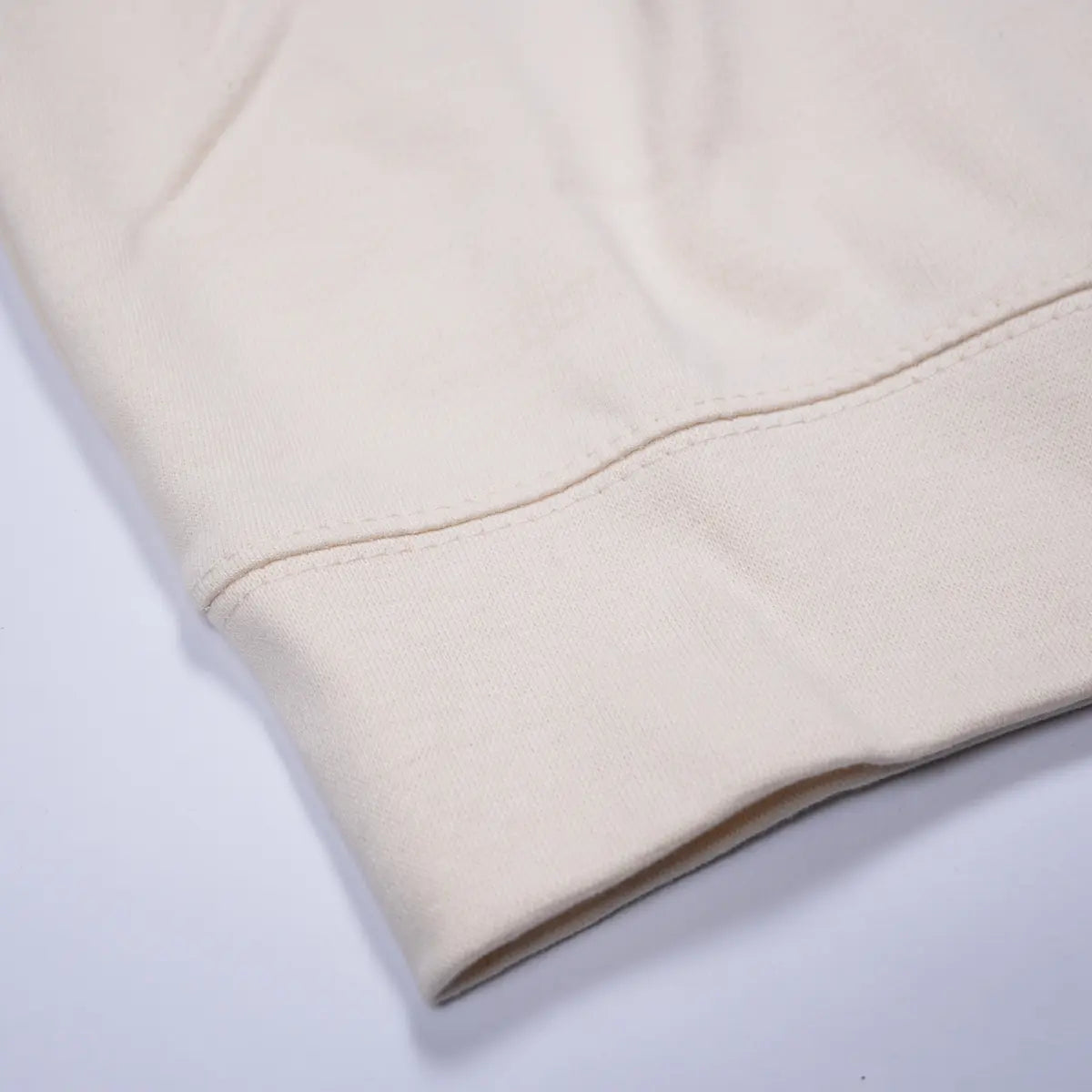 Super-soft Pemberley sweater in beige to celebrate your favourite novel.