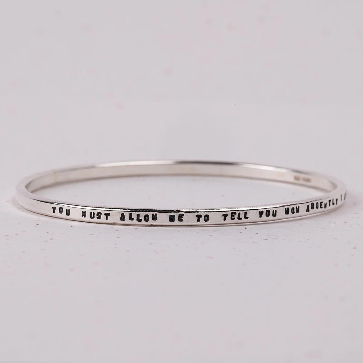 Bracelet with words "You must allow me to tell you how ardently I admire and love you"