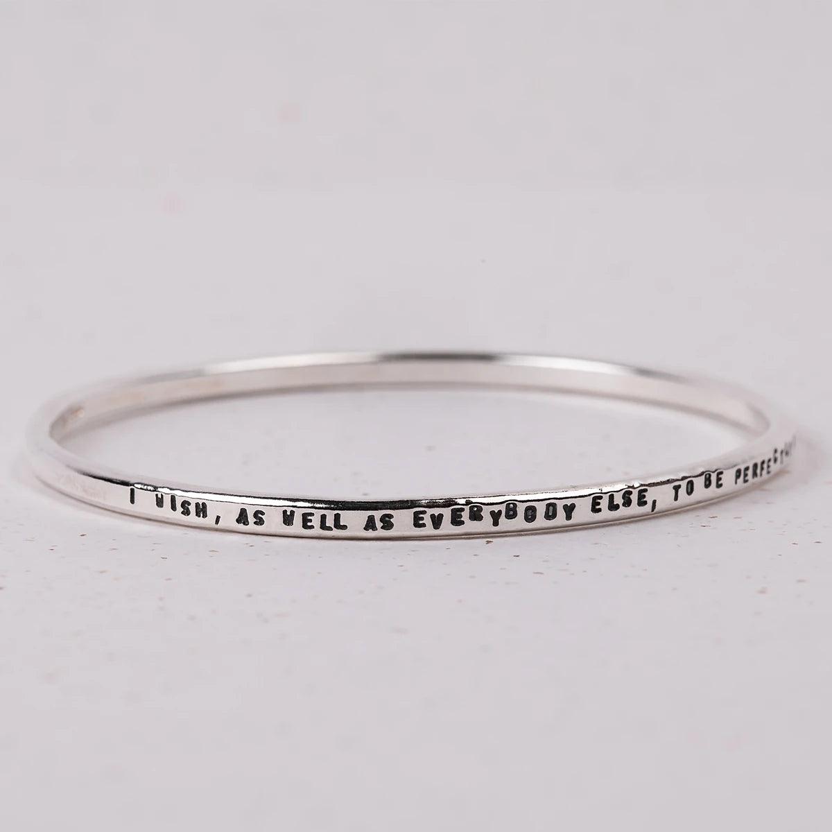 Bracelet with words "I wish, as well as everybody else, to be perfectly happy; but, like everybody else, it must be in my own way"