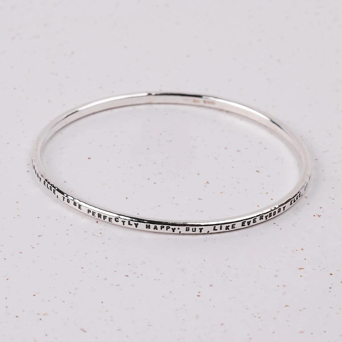 Bracelet with words "I wish, as well as everybody else, to be perfectly happy; but, like everybody else, it must be in my own way"