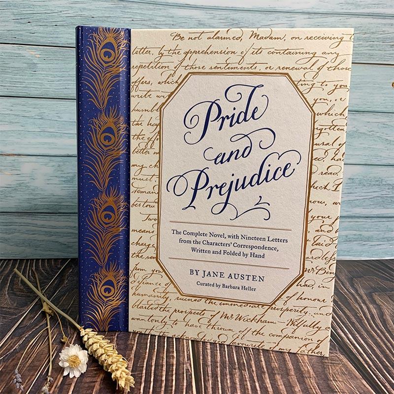 Pride and Prejudice Book with straw and flowers