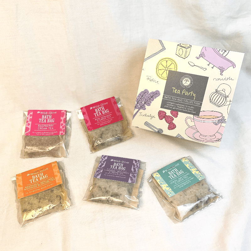 Tea party box with tea bags laid out. showing the different scents within the Tea gift set 