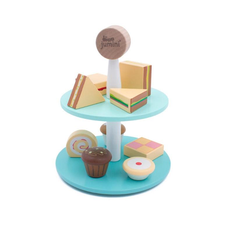 The adorable set is shown on a white background to show all the wipe-clean wooden food. 4 sandwiches and 5 different cakes