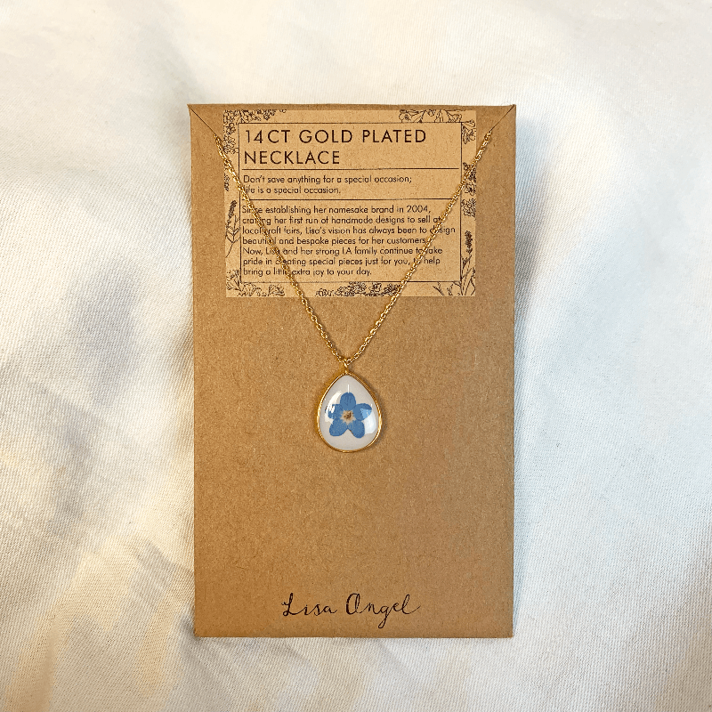 the necklace is shown here on its card, displaying it in all its beauty and demonstrated the floral pendent. Perfect for any regency fan.