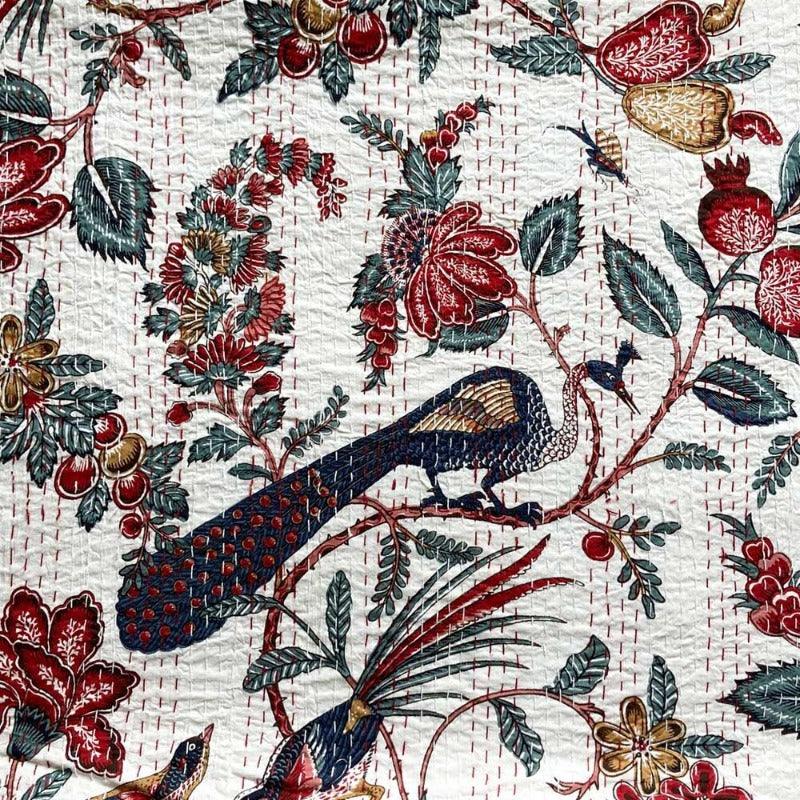 Pride and Prejudice peacock displayed on the cotton embroidered throw
