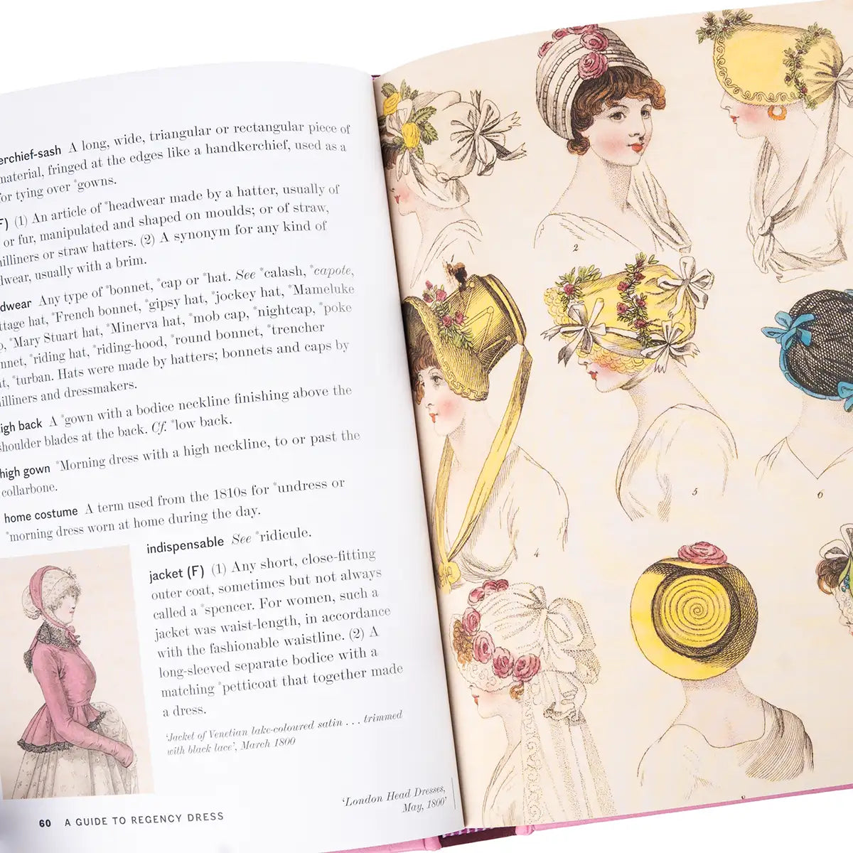 Book open to a page with illustrations of women in historical attire and text on fashion.