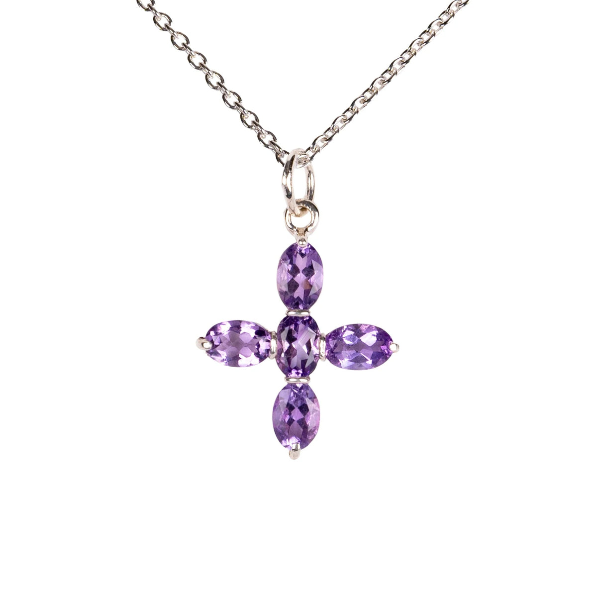 Charlotte cross necklace on a white background.