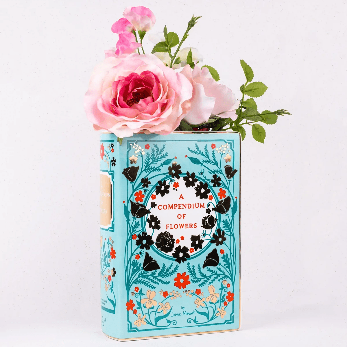 High-quality ceramic.  Includes the Oscar Wilde quote, "With freedom, books, flowers, and the moon, who could not be happy?"