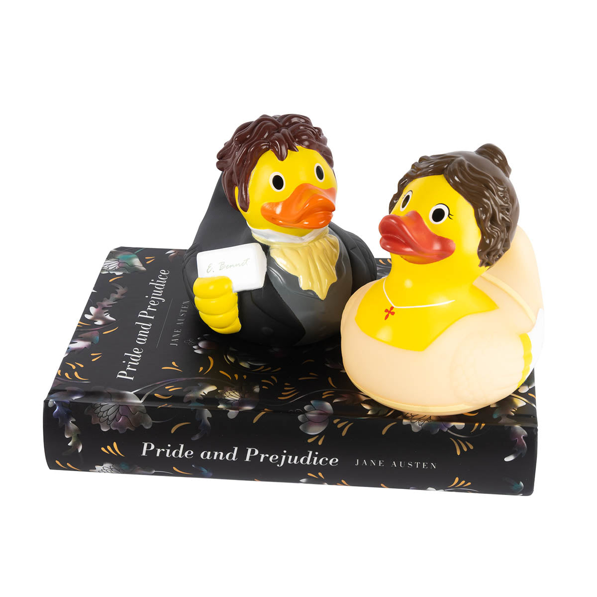 Elizabeth Bennet Rubber Duck and Mr. Darcy Rubber Duck sat on the cover of a copy of Pride and Prejudice.