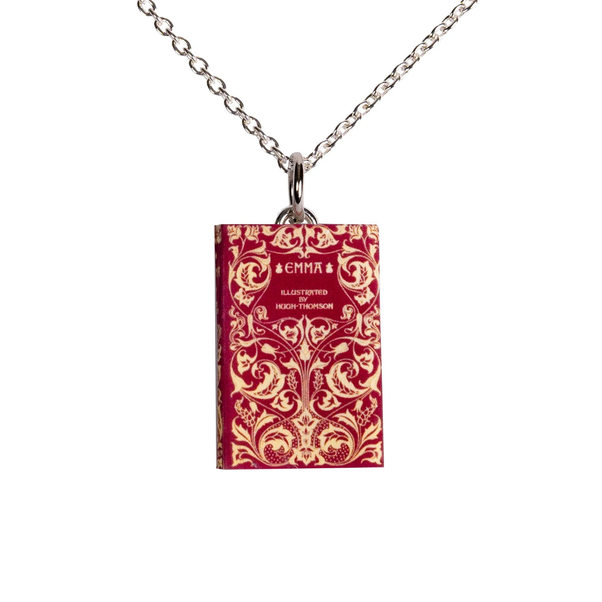A silver-plated chain necklace featuring a miniature book pendant with a red and gold floral design on the cover, resembling the cover of 'Emma' by Jane Austen.