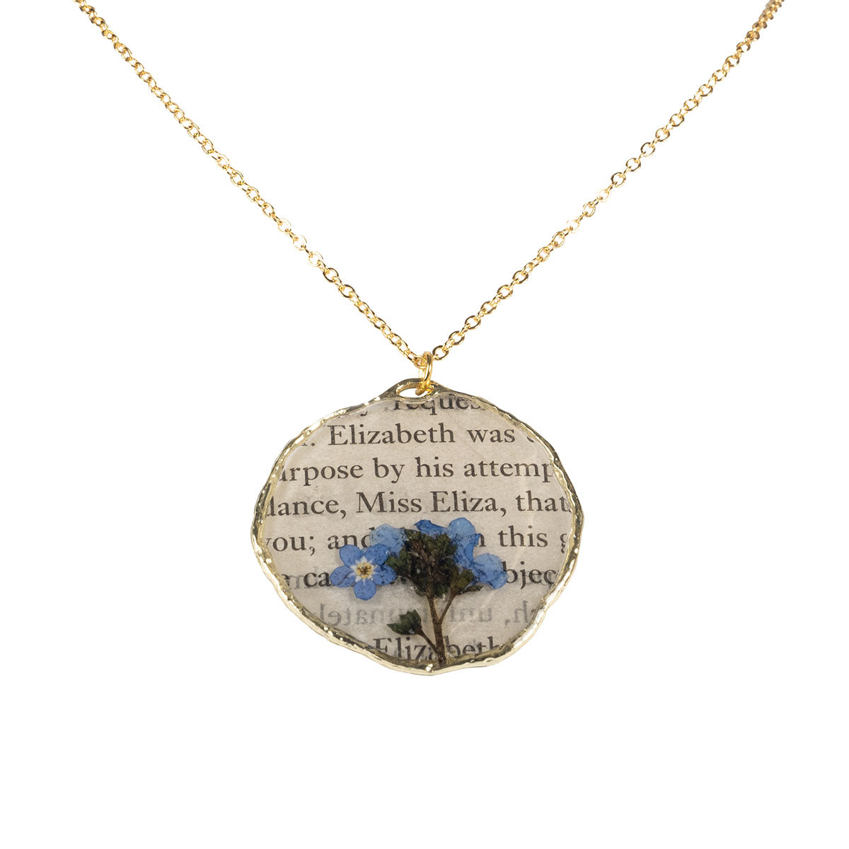 Front view of Pride and Prejudice Necklace featuring text from pages of Pride and Prejudice and a pressed forget me not flower