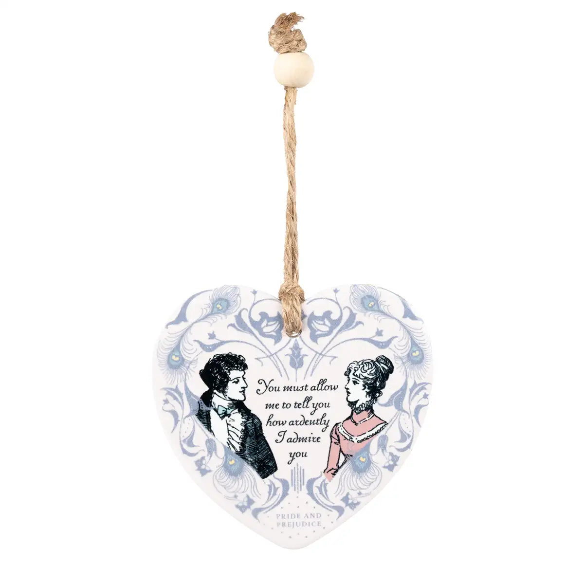 Heart-shaped hanging plaque with romantic illustration and text on a white background