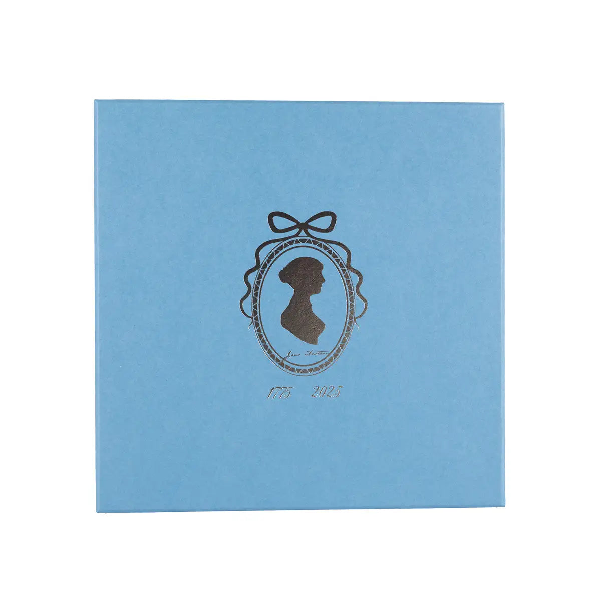 Silver silhouette design on a blue box