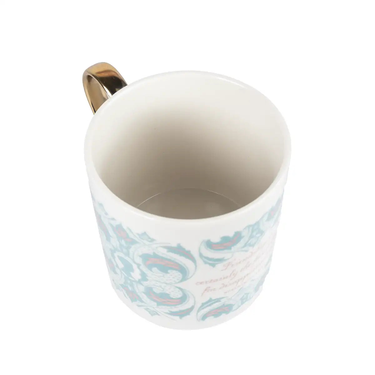 White mug with gold handle and blue pattern on a white background
