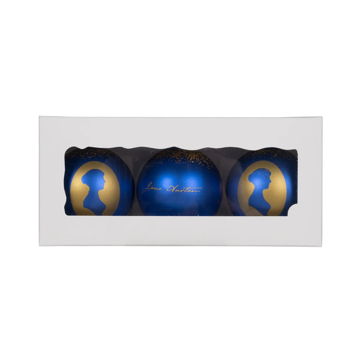Set of three baubles, two silhouette and one signature design, in white box. It is n a white background