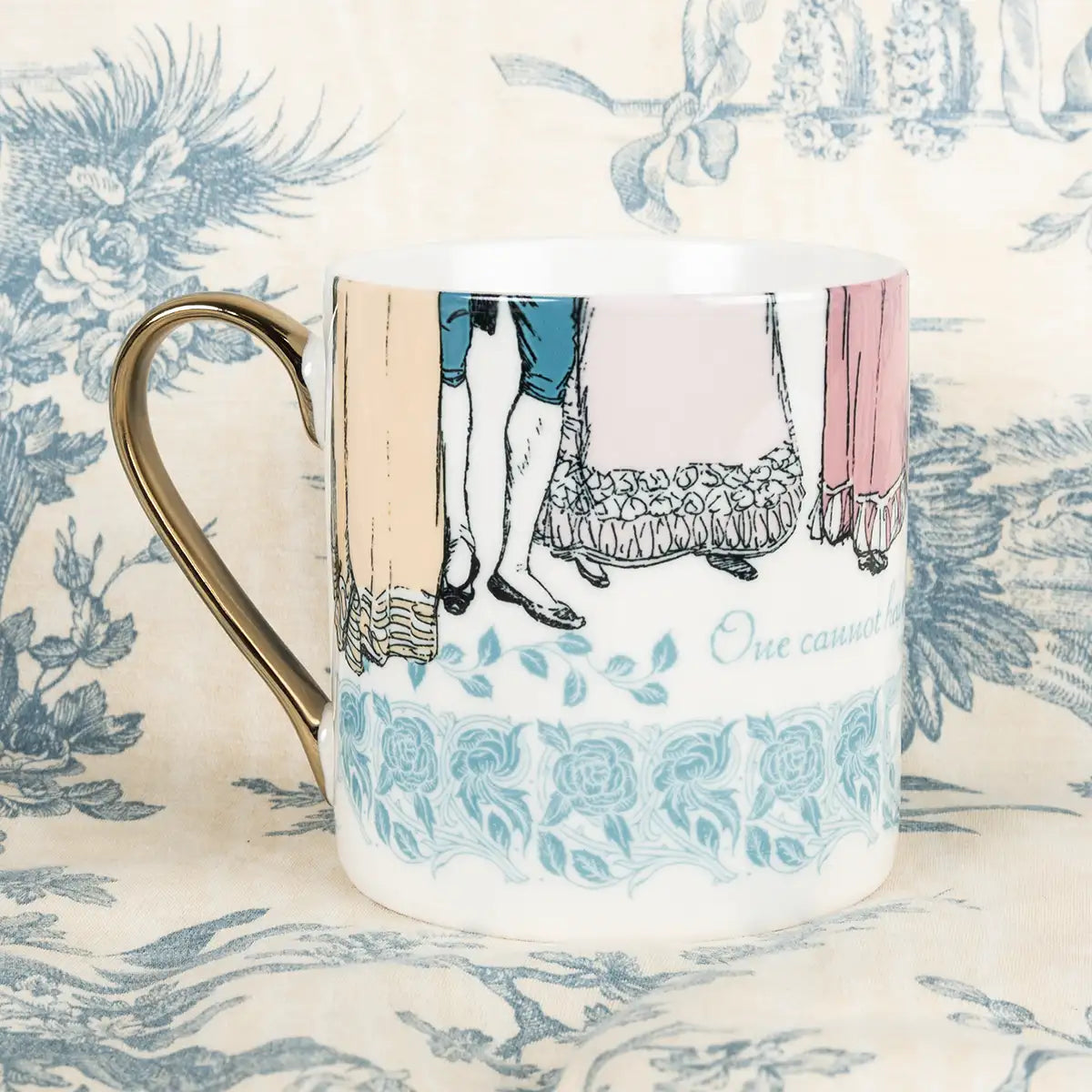 Mug with vintage-style design of Regency ball attendees. Show bottom of their outfits. Taken on a floral patterned background.