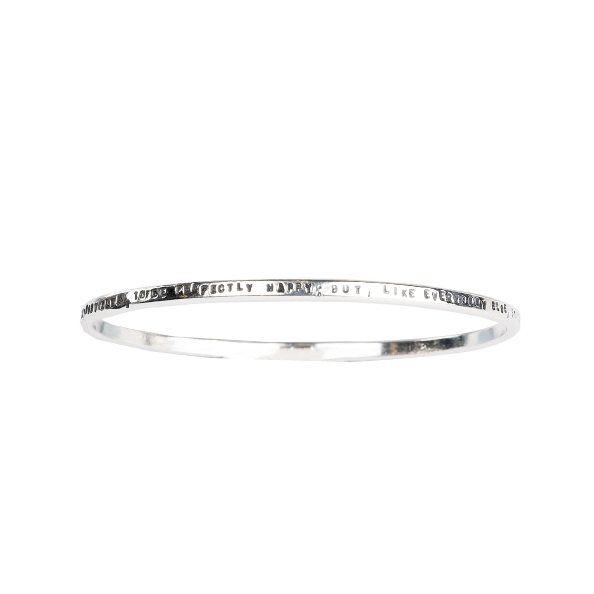 Silver bracelet with words "I wish, as well as everybody else, to be perfectly happy; but, like everybody else, it must be in my own way" stamped on it