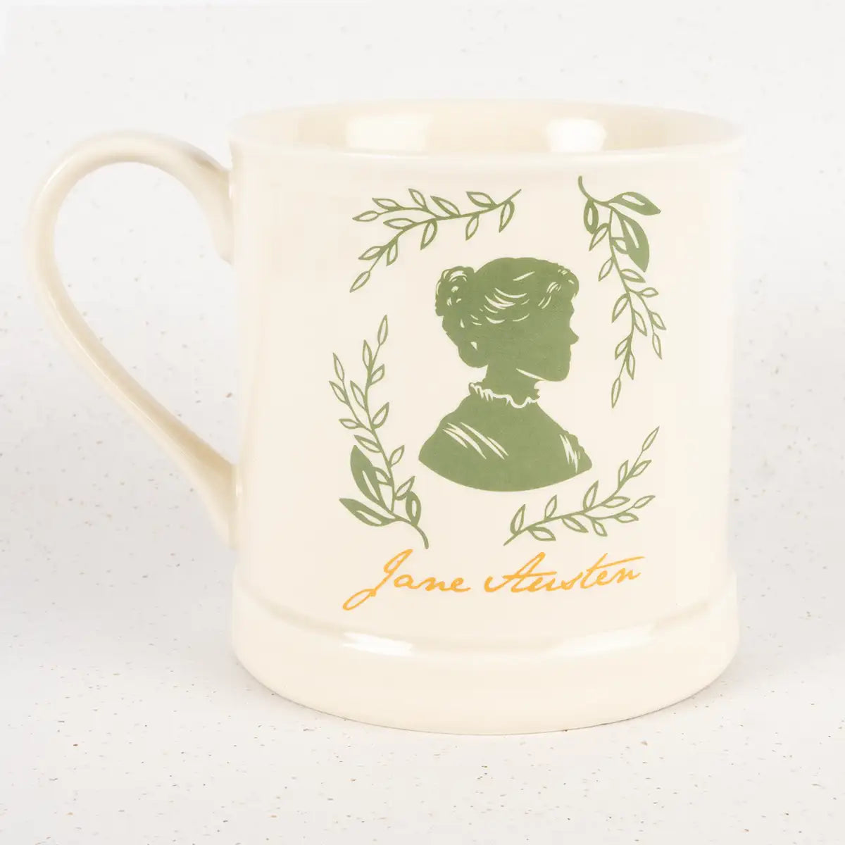 Mug with green silhouette and 'Jane Austen' text on a white background