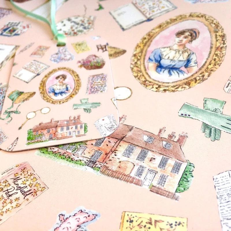 Designed by hand, this rosy pink gift wrap is sprinkled with meticulously illustrated items to make any Jane Austen fan rejoice: Regency bonnets, a set of playing cards, lady's gloves, Jane Austen's famous writing desk, and even more.
