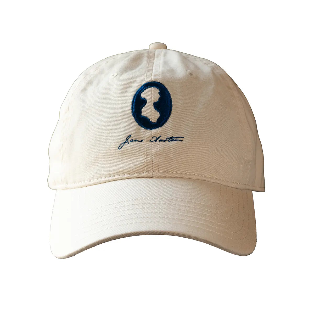 Cream coloured jane austen cap against white background