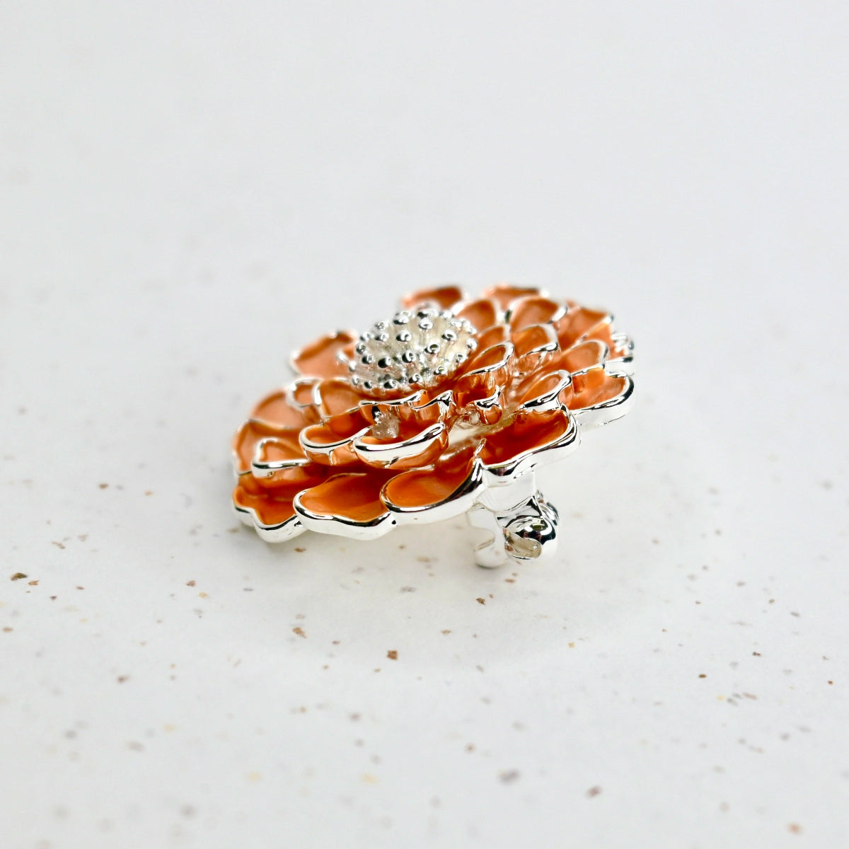 Marigold brooch.