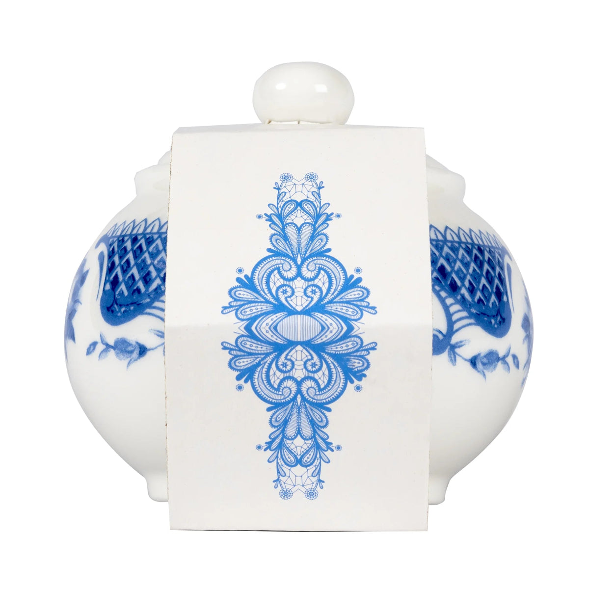 White, bone china sugar bowl with blue, floral patterns.