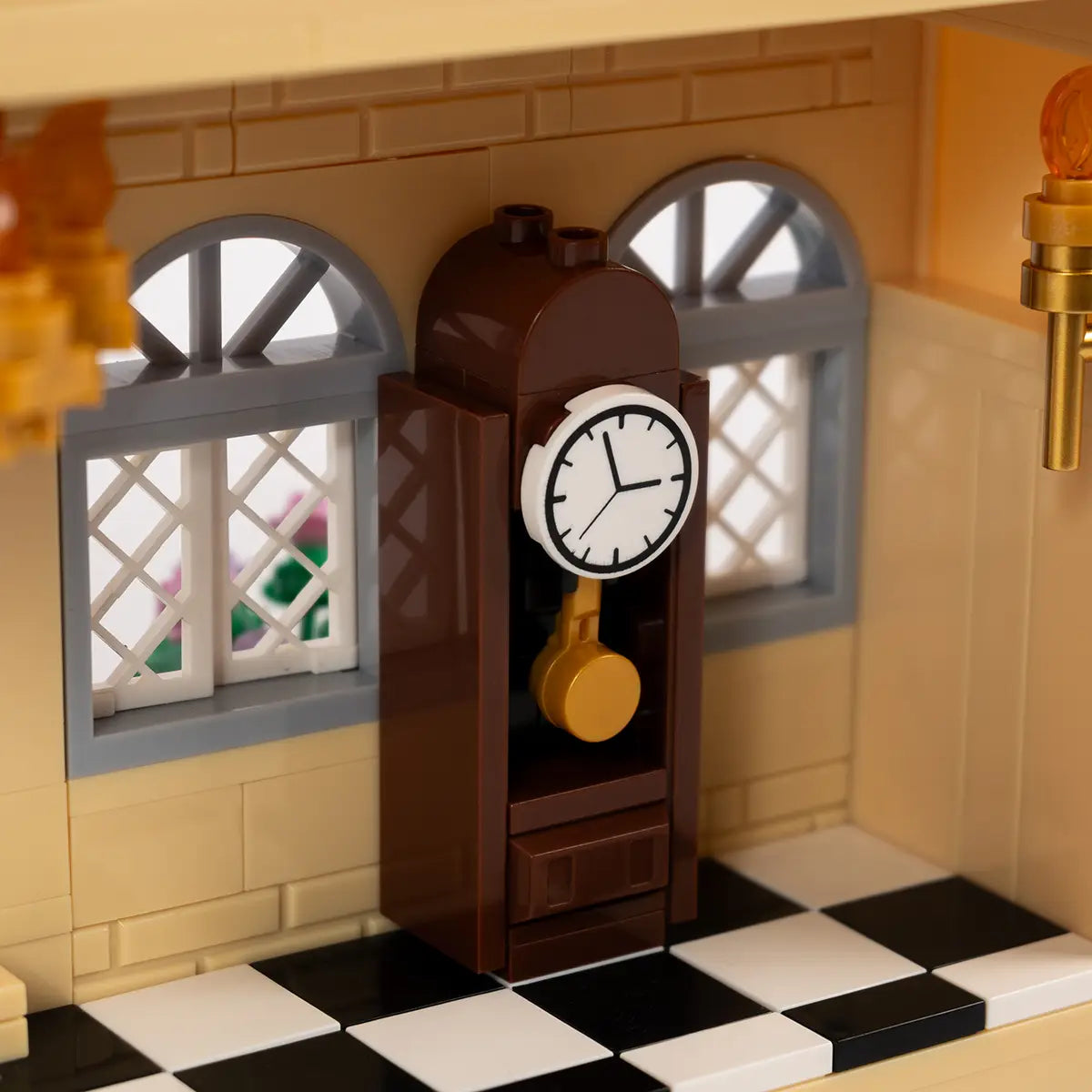 Close up shot of clock detail in brick toy version of Pemberley