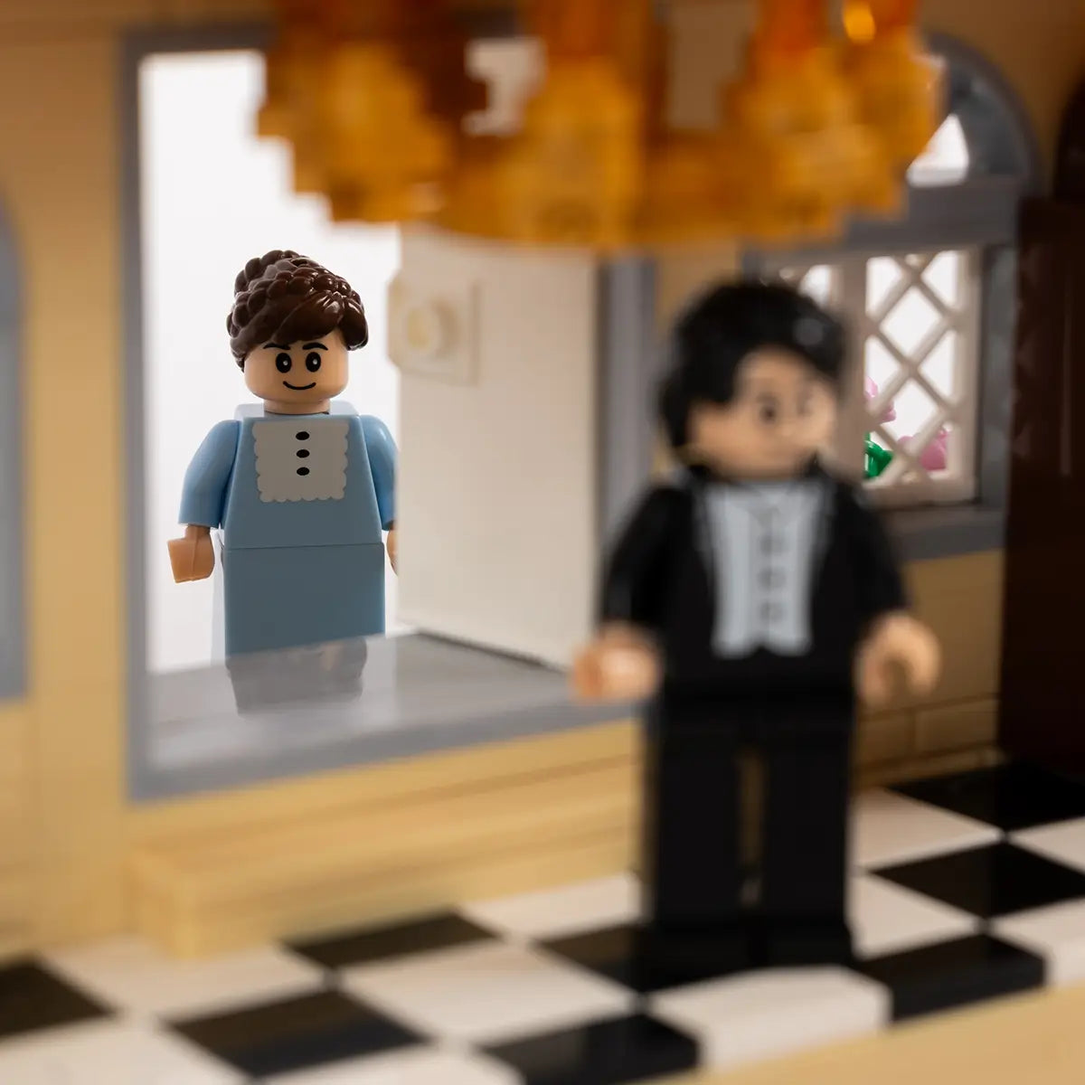 Interior of Jane Austen Lego style Pemberley Manor featuring Lizzy Bennet and Mr. Darcy minifigs
