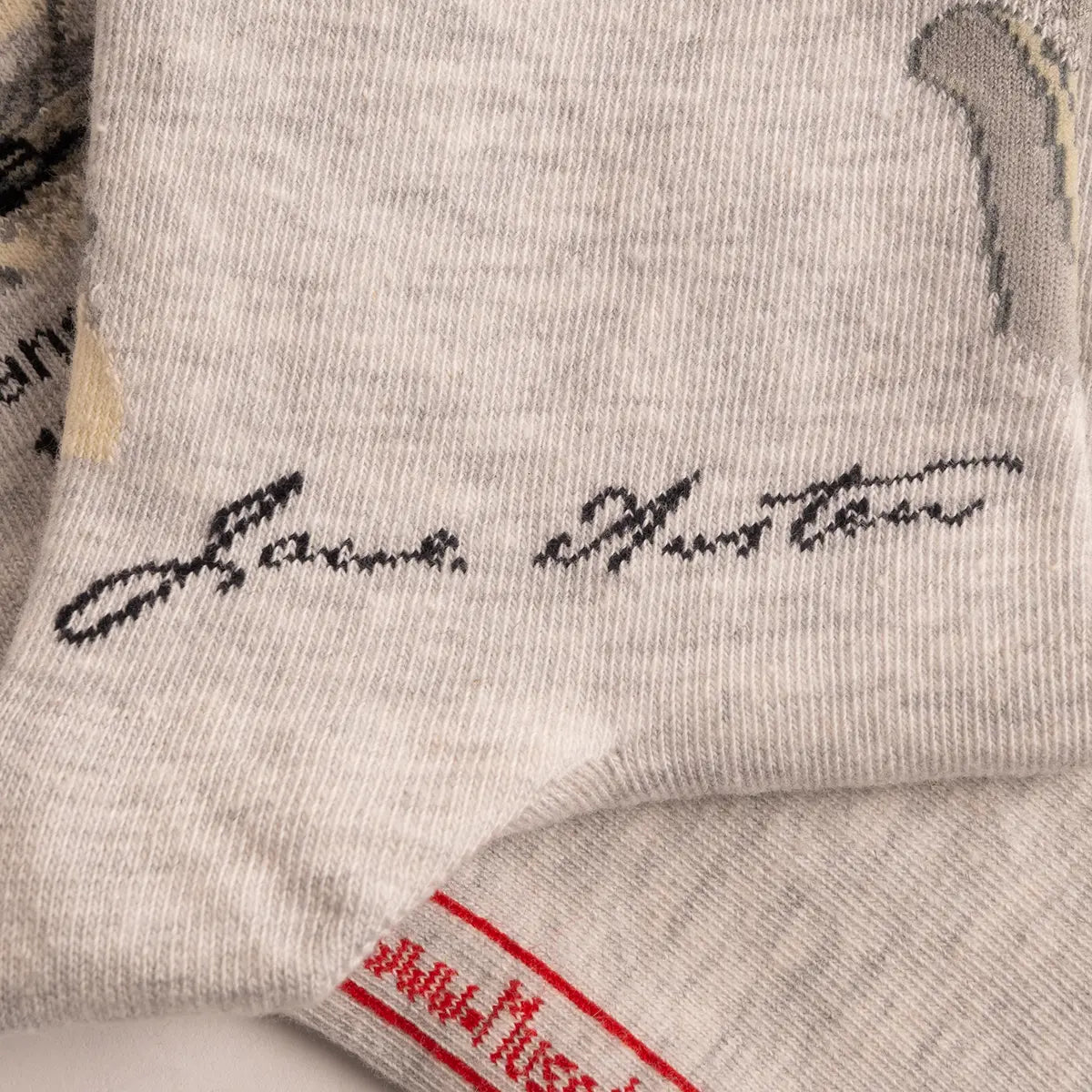 Close up on Jane Austen signature on socks