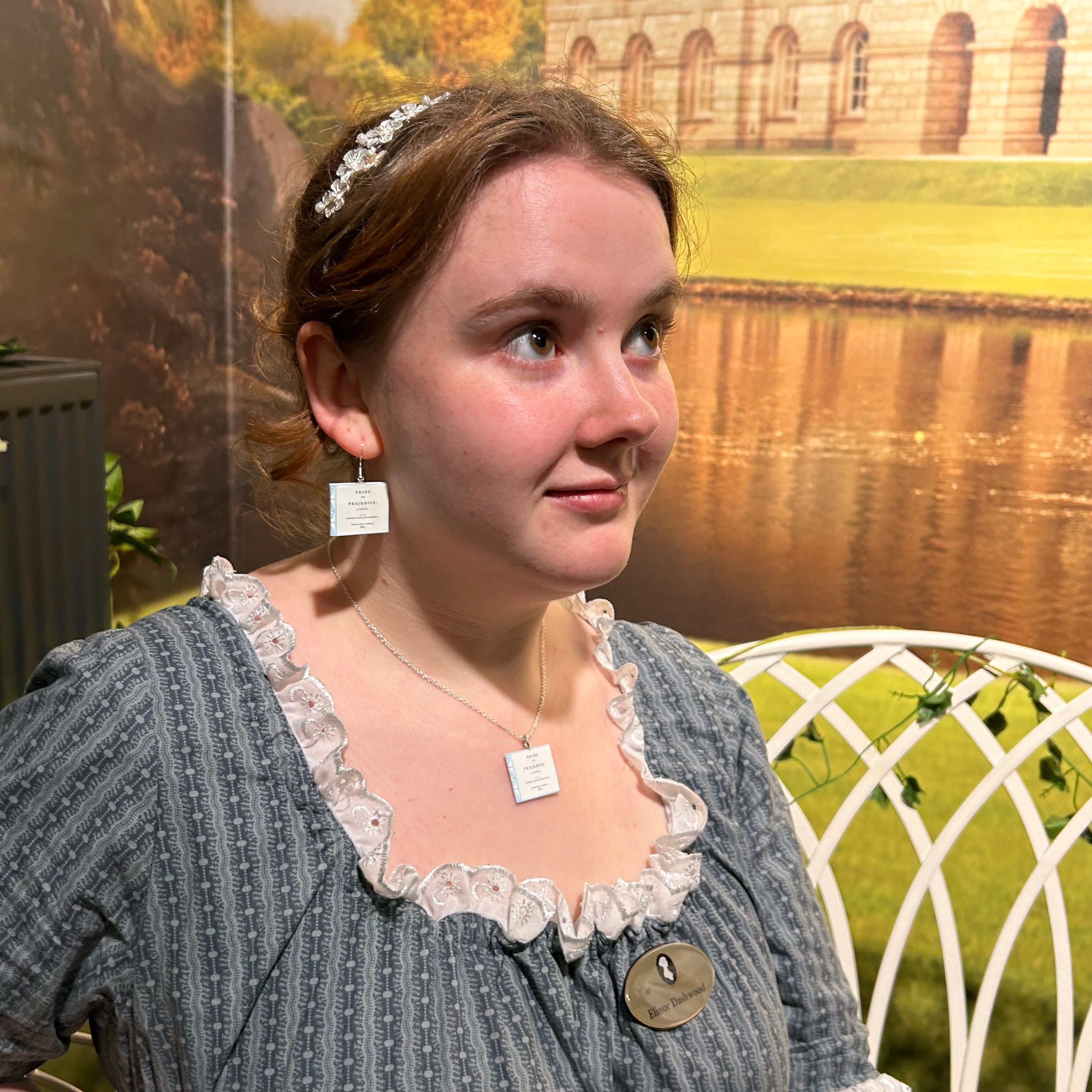 Regency Actress with Earrings and Necklace that look like Books