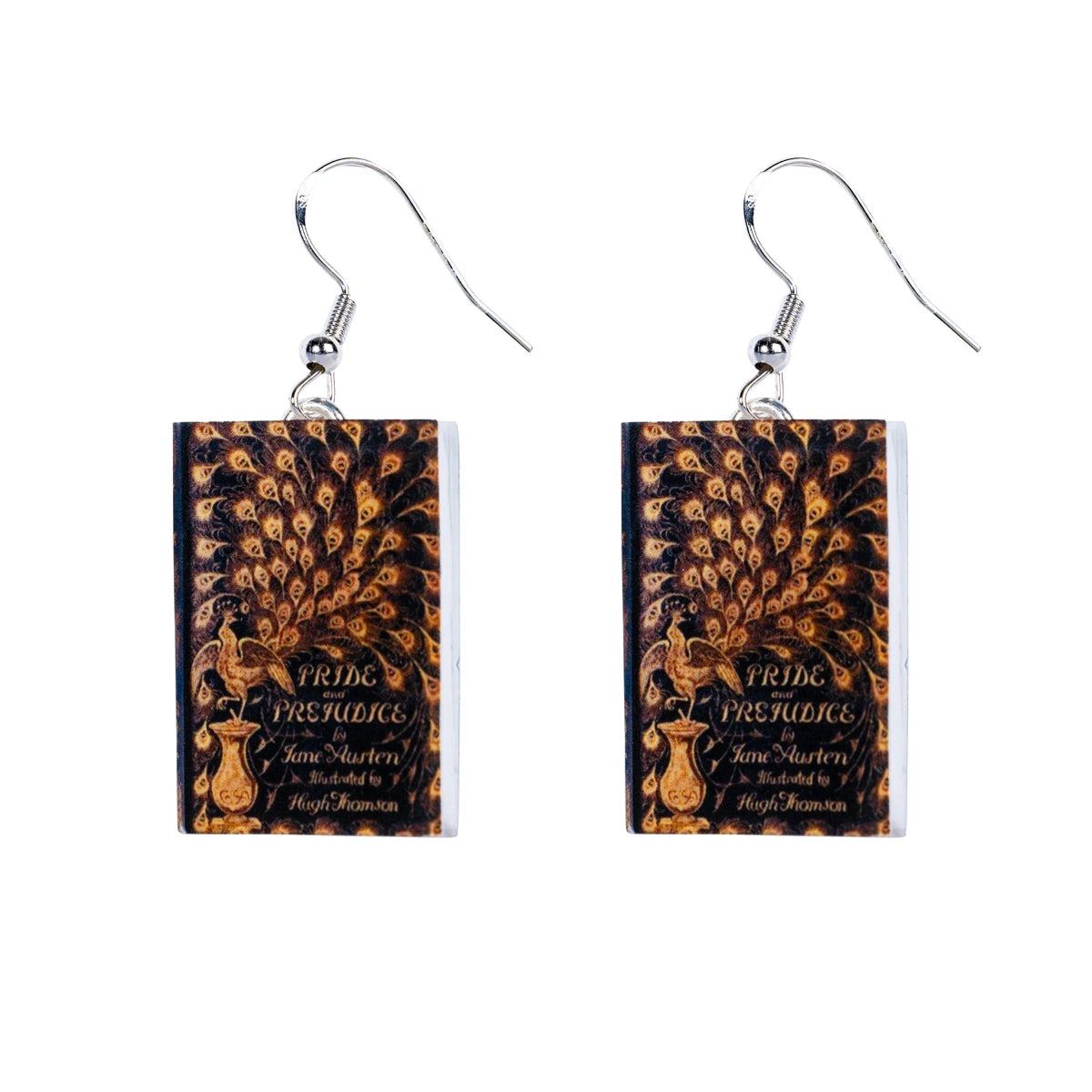 A pair of hook earrings, each featuring a miniature book cover replica of 'Pride & Prejudice' with a peacock illustration in silver and brown colors.