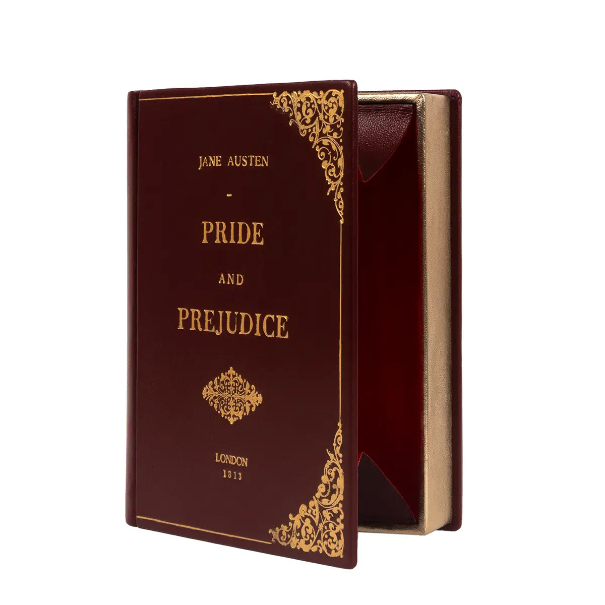 shot of the Pride and Prejudice Book Clutch Bag in Burgundy open against a white background with red silk moire interior visible