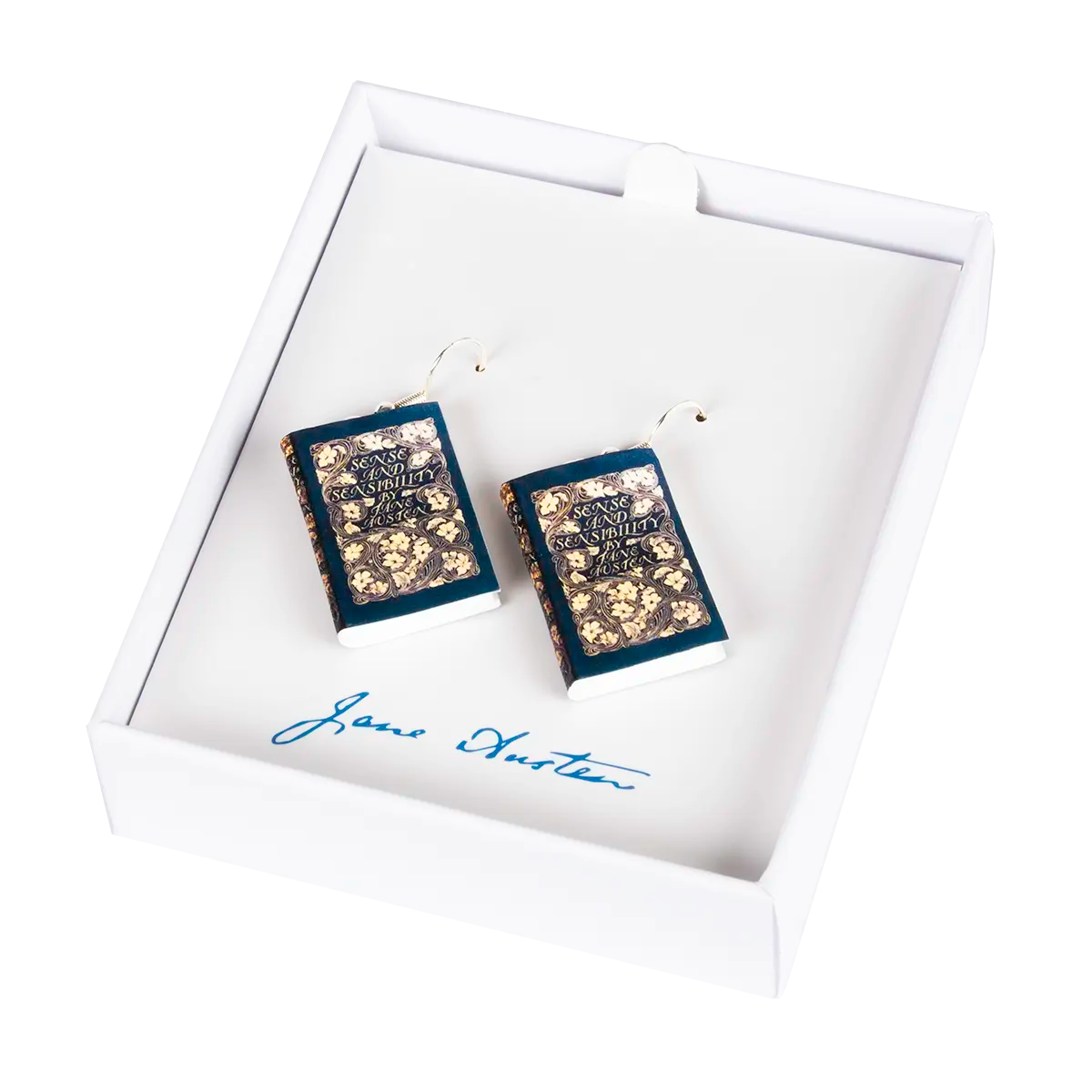 Book-shaped earrings in a white box with Jane Austen's signature.